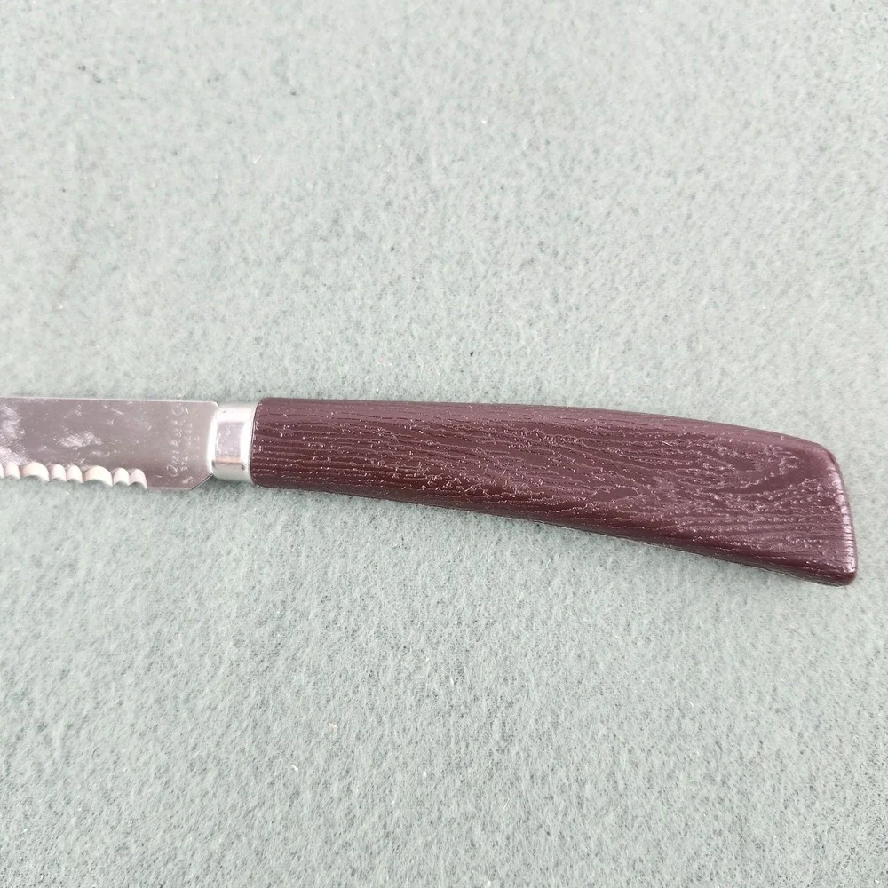 Vintage QUIKUT Serrated Steak Knives Plastic Faux Wood 4